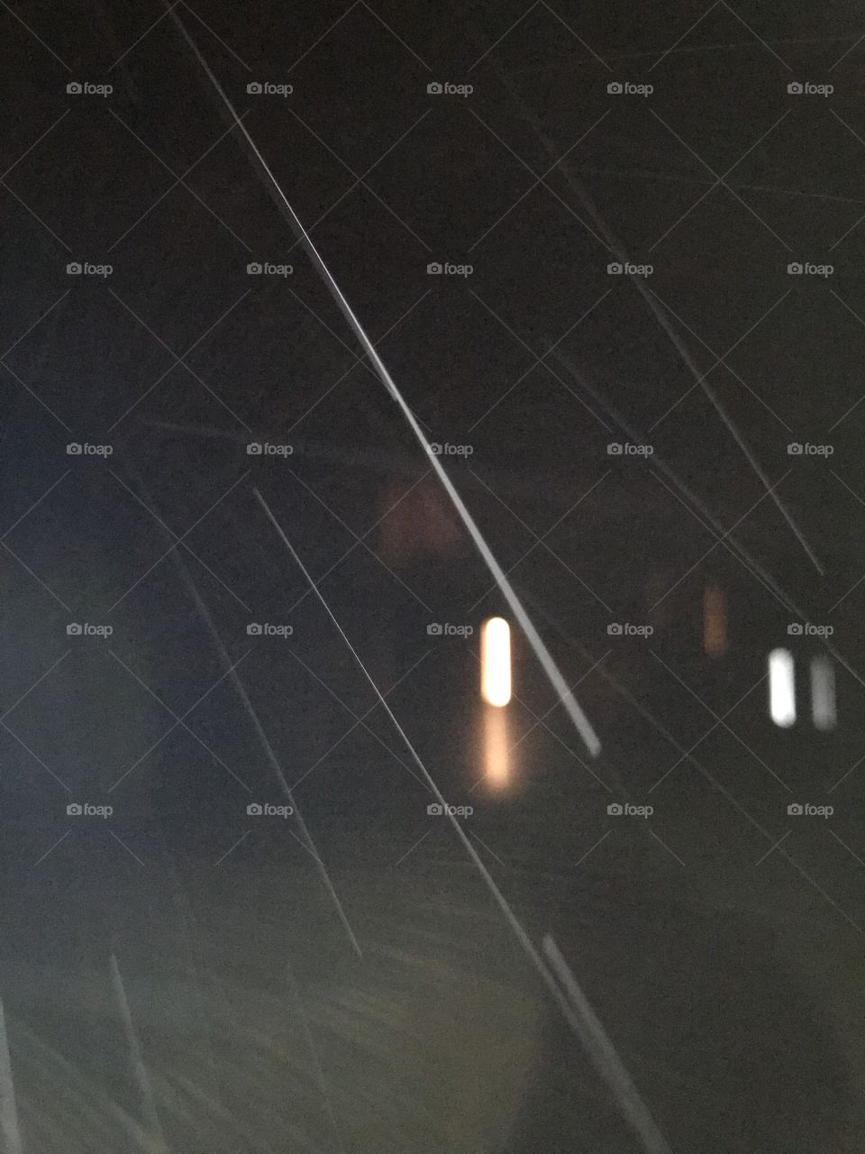 Rain captured by lens. This was taken on the New Year’s Eve, when I were outside waiting for fireworks. It started raining, and I managed to capture it. It makes a really cool, nature ish look. Looks kind of blurry