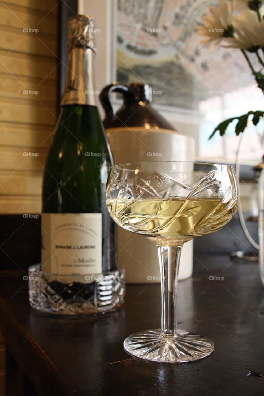 Sparkling wine in crystal Coupe glass
