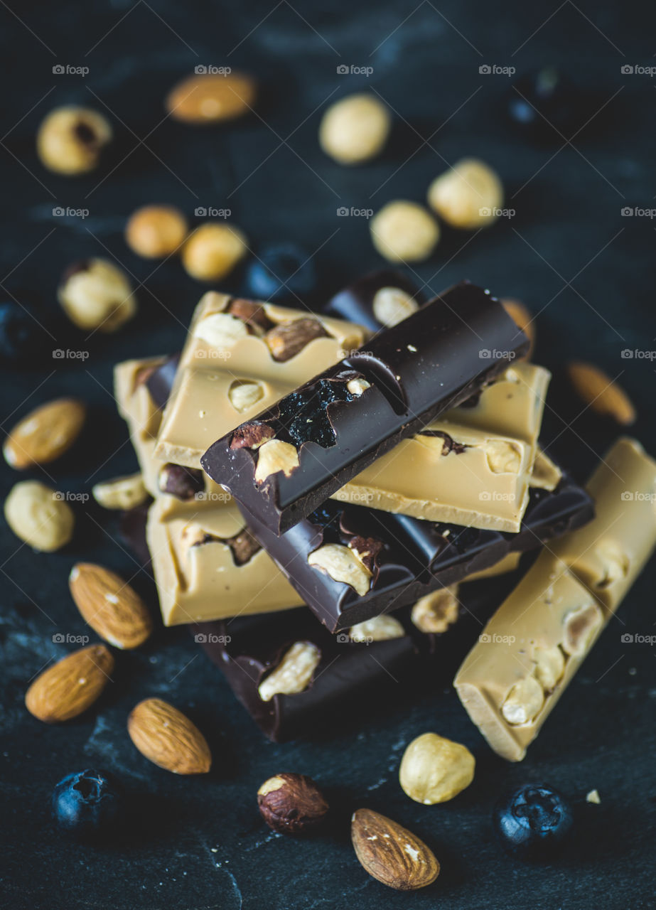 White and dark chocolate with nuts and berries.