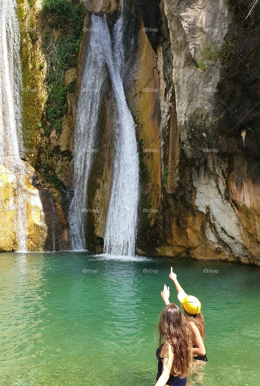 Waterfall#river#rocks#humans#nature