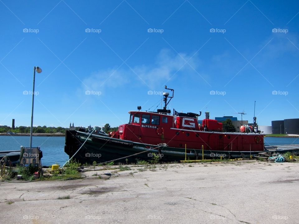 Red tug boat
