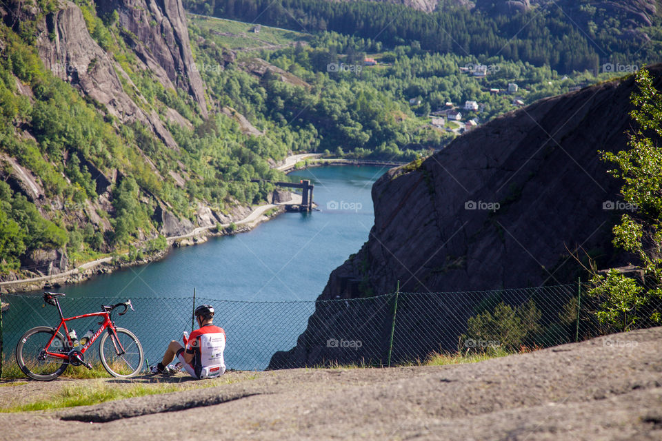 Cyclist in the fjords. 