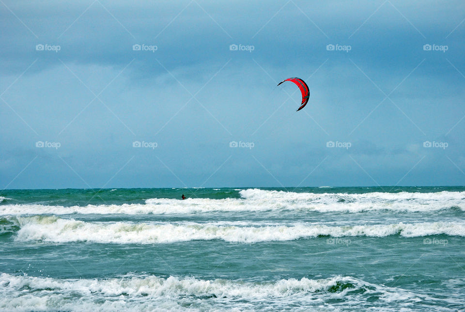 wind surfing on strong waves