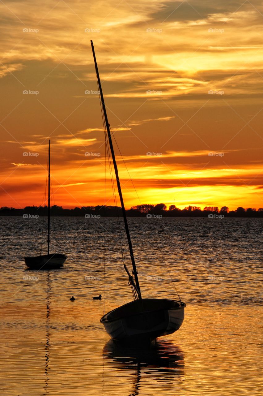 Sailboats in sunset