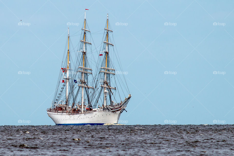 Big sailship on the open sea.