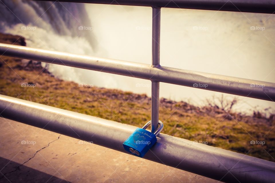 Love lock honeymoon capital of the world Niagara Falls NY.  This is the only love lock I have ever seen placed here! 