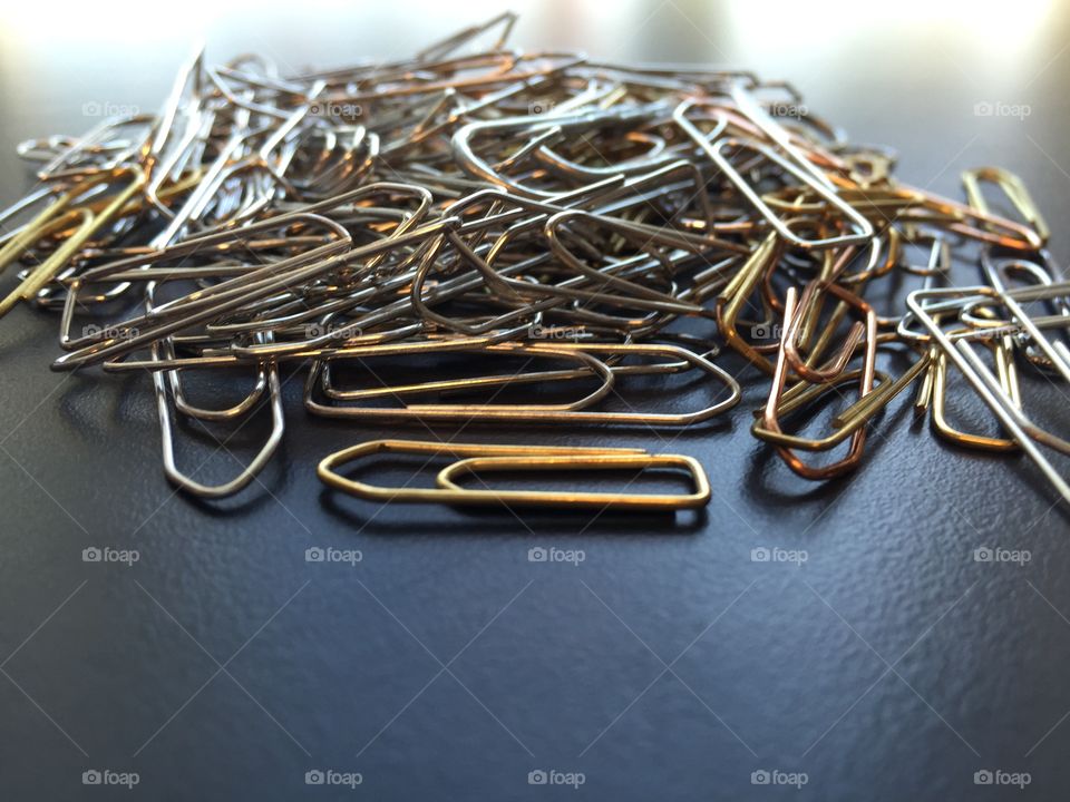 Paper clips. a stack of paper clips