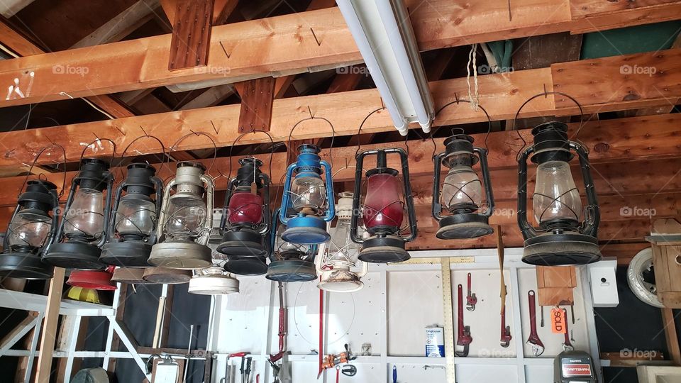 A collection of antique kerosene lanterns.