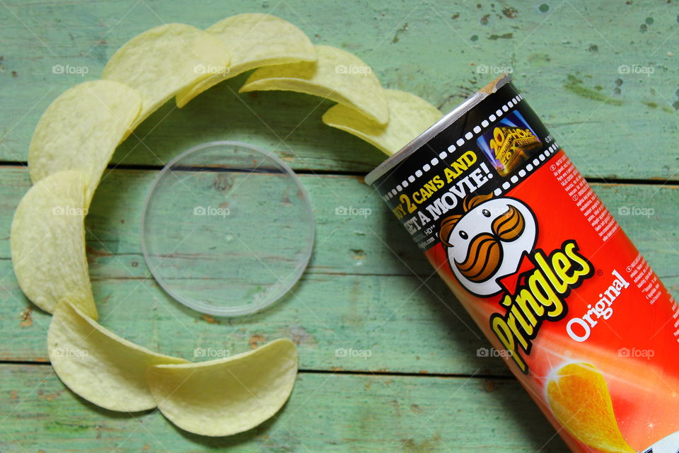 Pringles chips on a wooden table