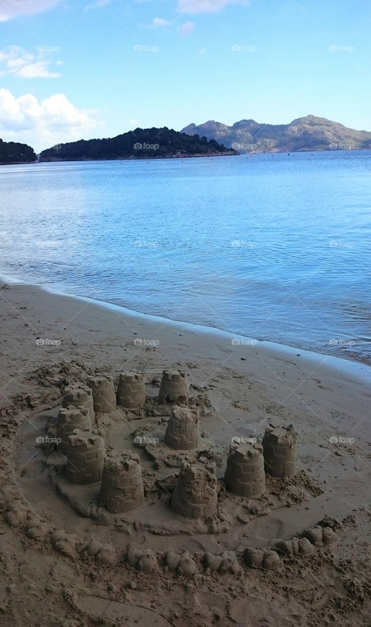 Sand castle on the beach