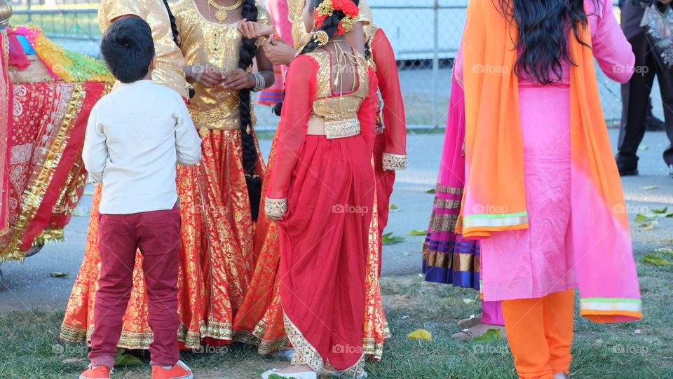 Brightly clothed festival goers