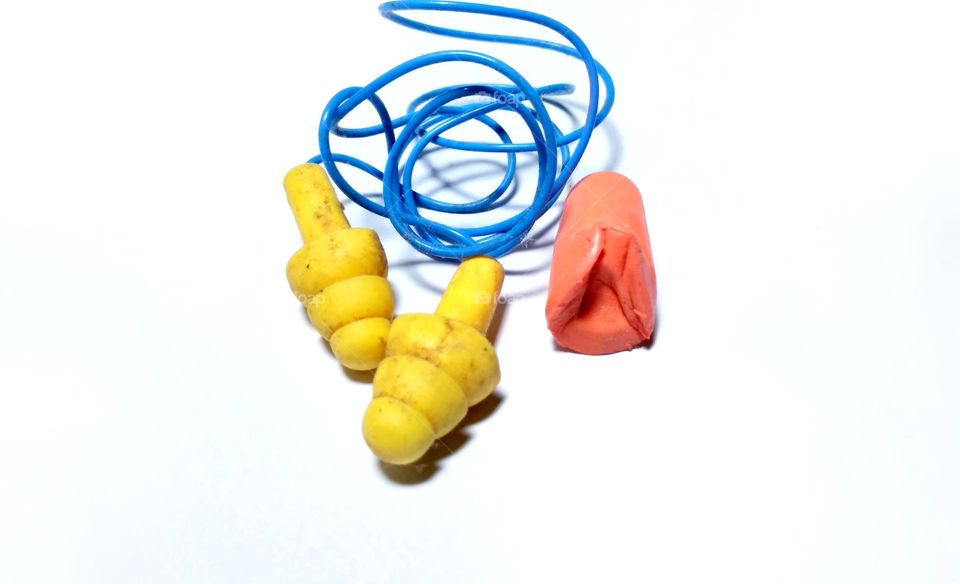 Yellow ear plugs on the table