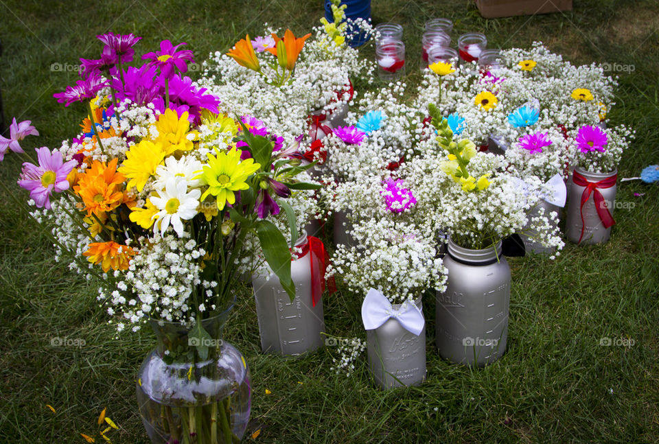 COLORFUL FLOWERS IN SILVER JARS