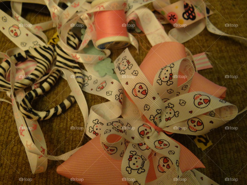 Bow Making. Supplies and ribbon for making bows. 