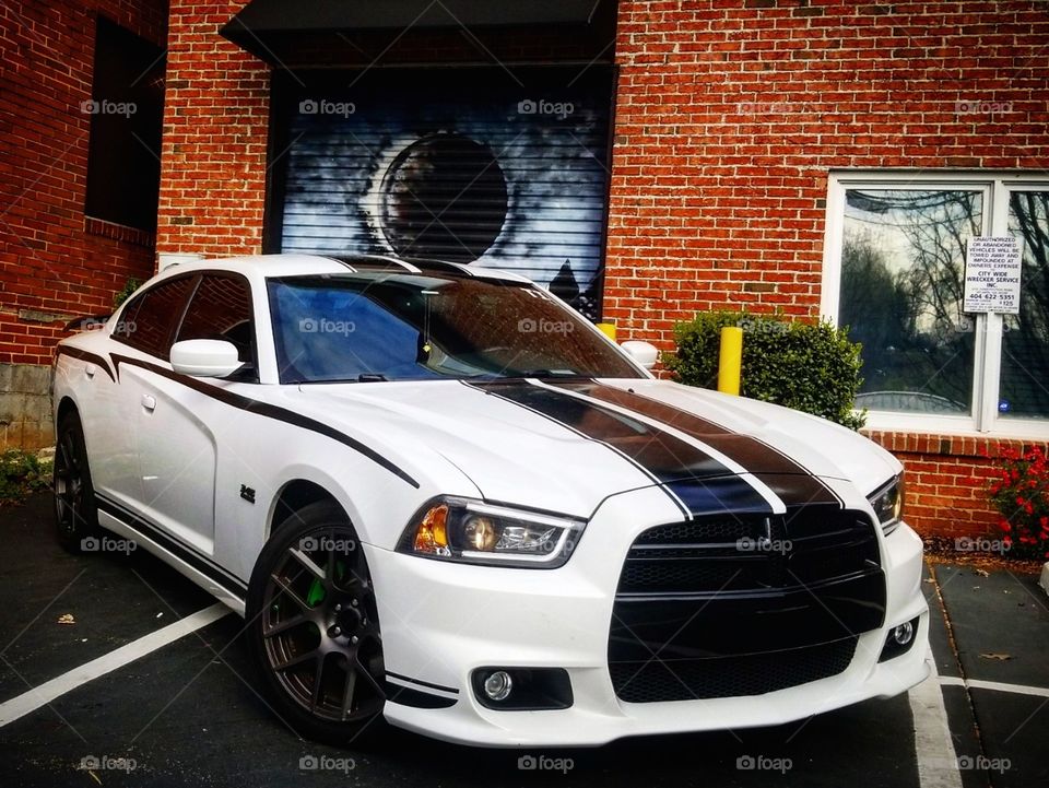 White Dodge Charger with graffiti in Atlanta