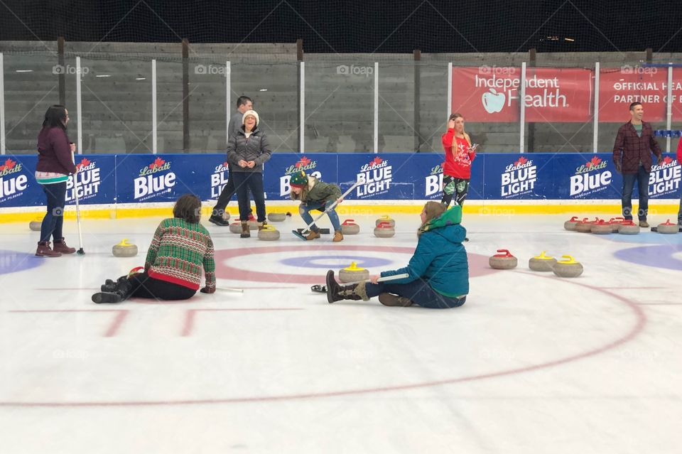 Curling for the first time at our holiday party went well. 