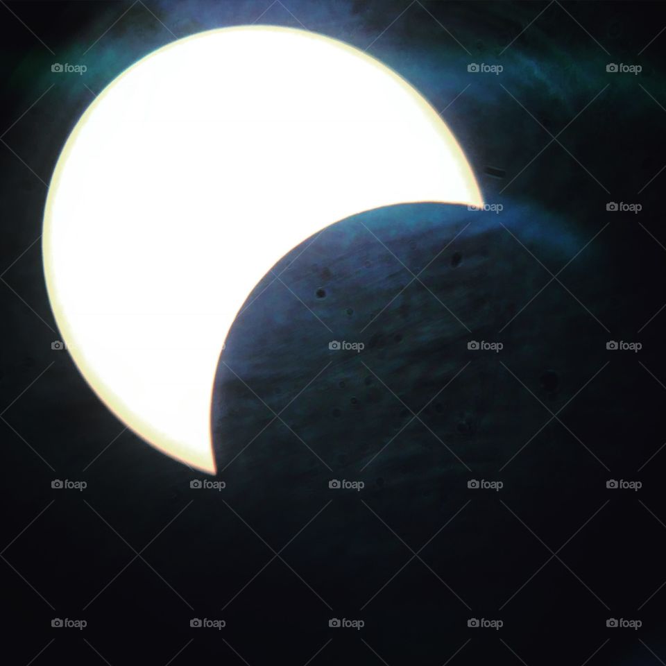 Solar eclipse through telescope lens 