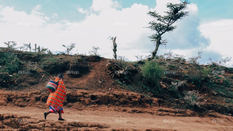 Maasai man going home