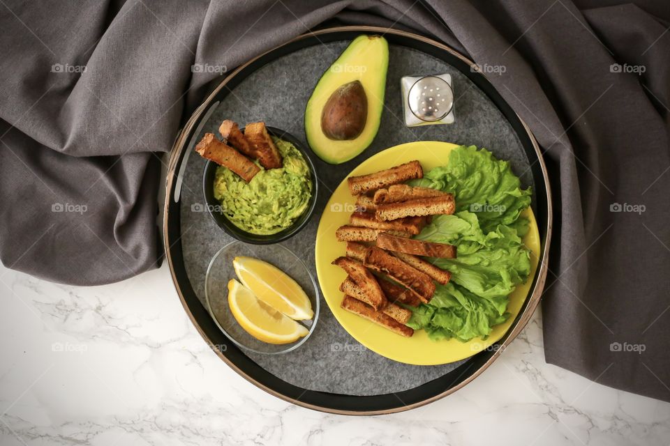 Guacamole with bread and avocado 