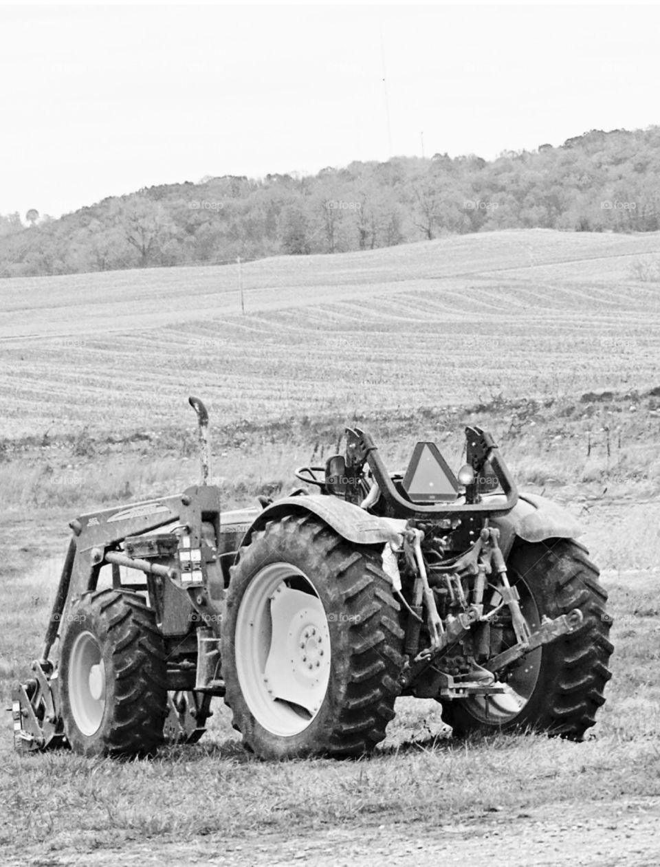 Tractor  left in the field after Fall harvest 