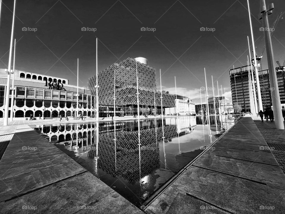 Black-and-white scenery of Birmingham Library reflections.