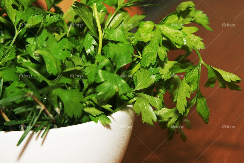 Packet of parsley on a bowl