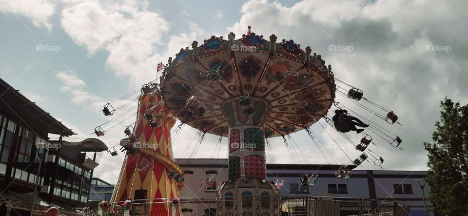 Having fun outdoors and going on Fairground rides