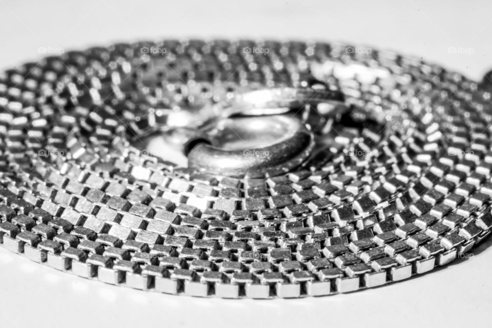 Black-white macro view jewelery silver necklace closeup