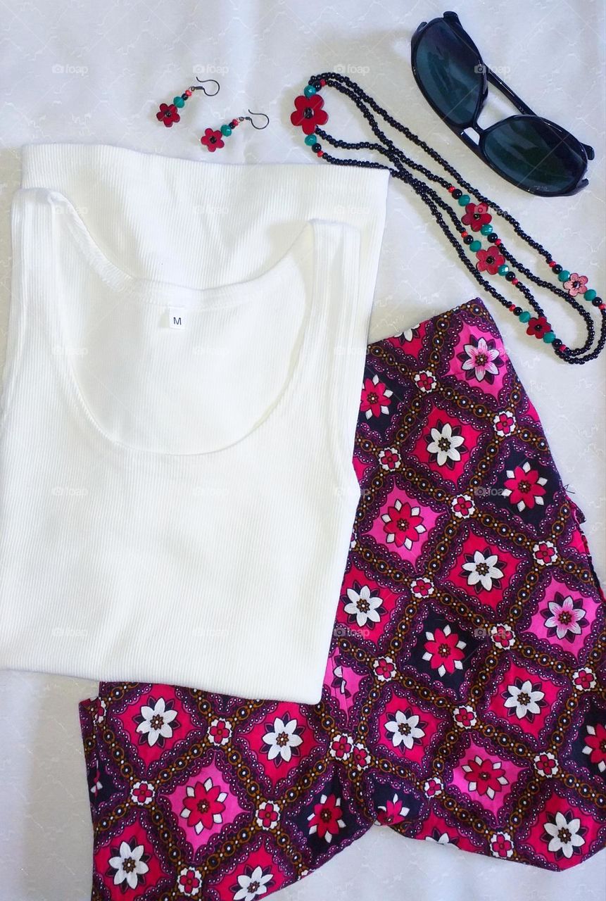 Ladies summer outfits - white top, beautiful floral design shorts, sunglasses, handmade earrings and necklace