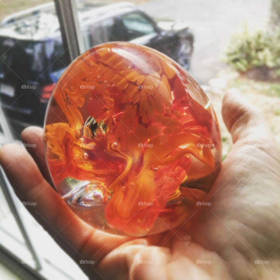 My meager attempt at glass blowing (with lots of help) produced this little beauty of a paperweight 🌞