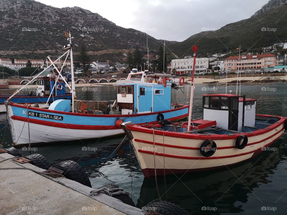 Fishing boats in Kalk Bay harbor, South Africa