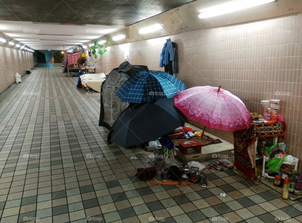 A habitat of homeless people in the subway near Happy Valley Racecourse, Hong Kong