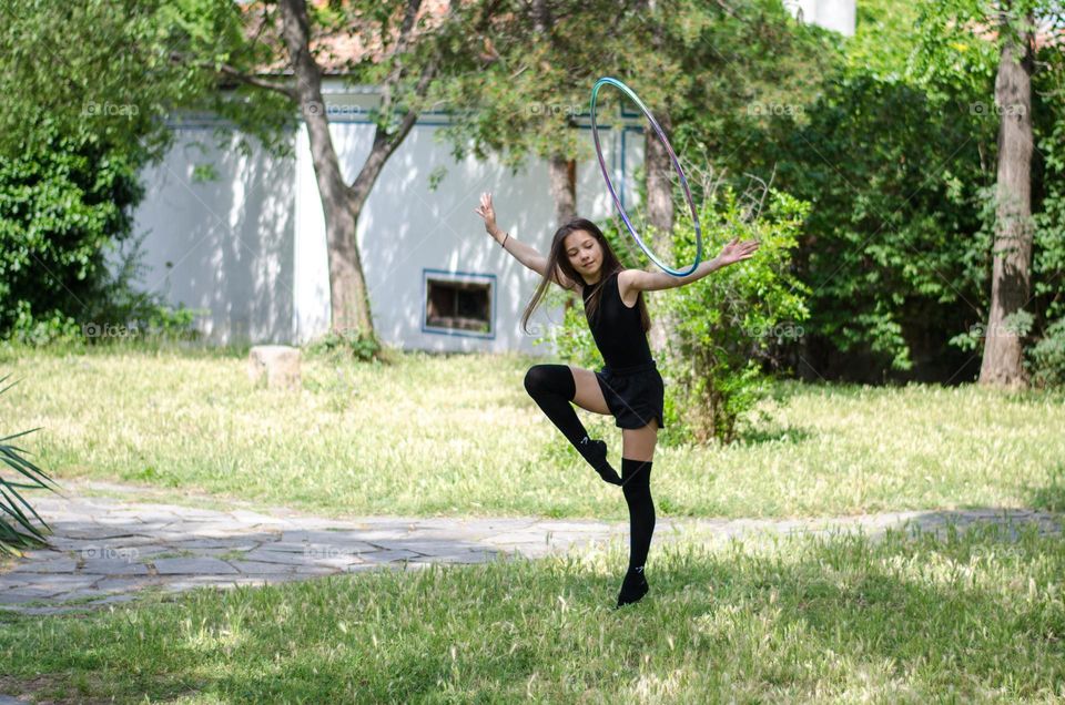 Beautiful Young Gimnast Dancing in Nature