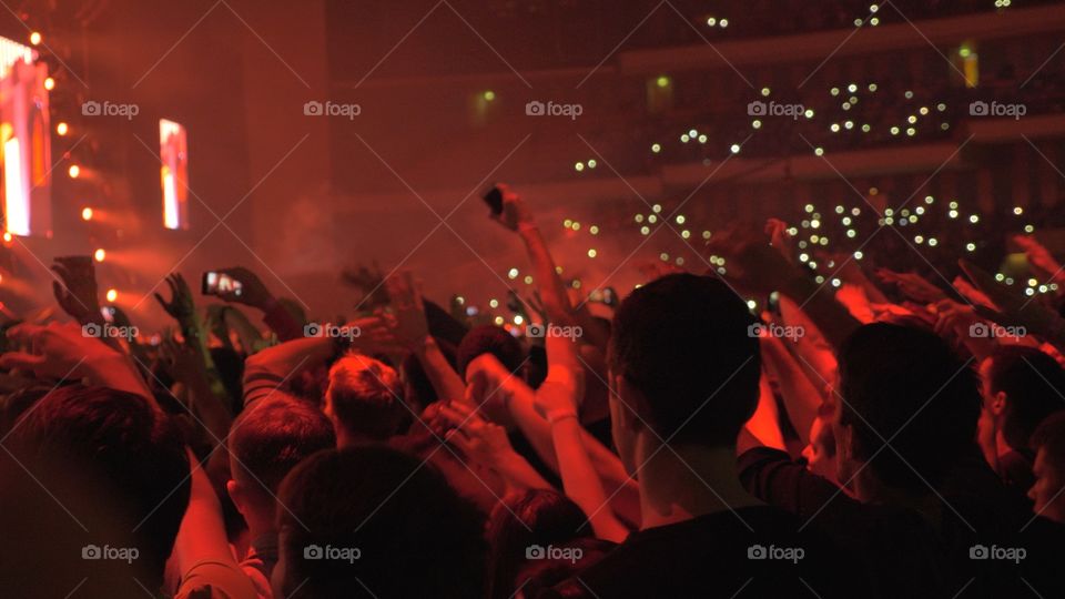 fans at a concert with phones