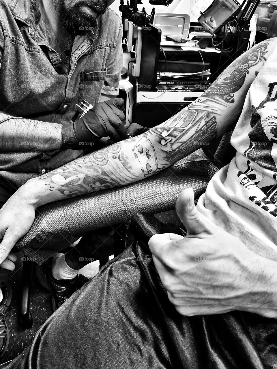 My best friend getting his tattoo sleeve finished.