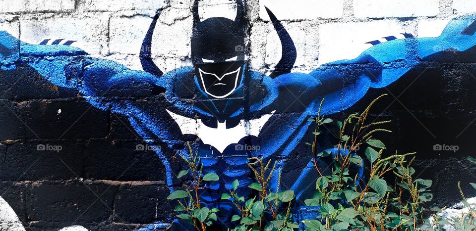 batman in wall paint, street art