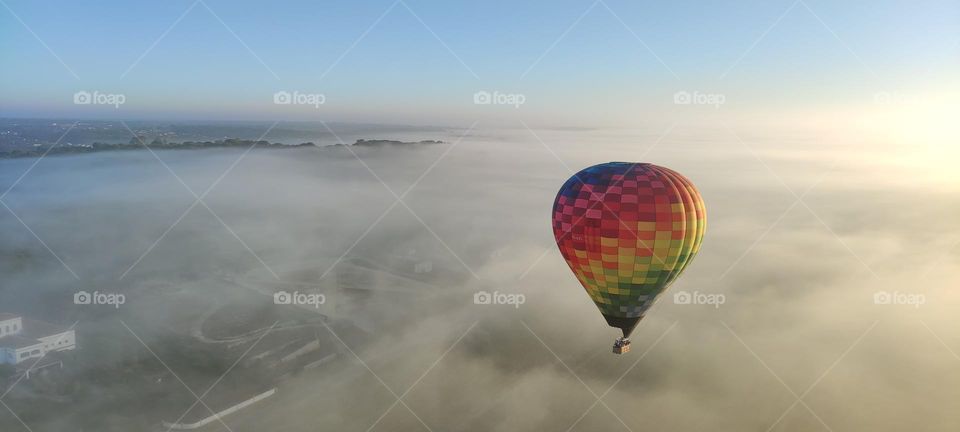 Balloon over the clouds