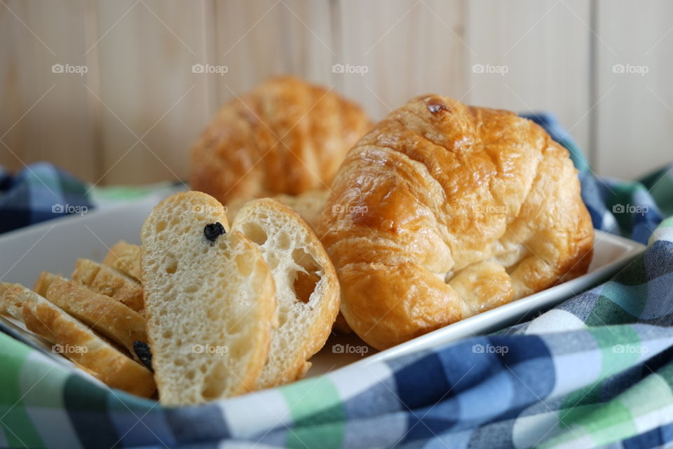 Breads for breakfast. Ginger bread and croissant for breakfast