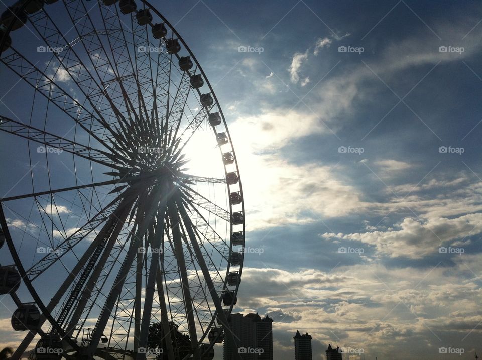 Ferris wheel with sun light