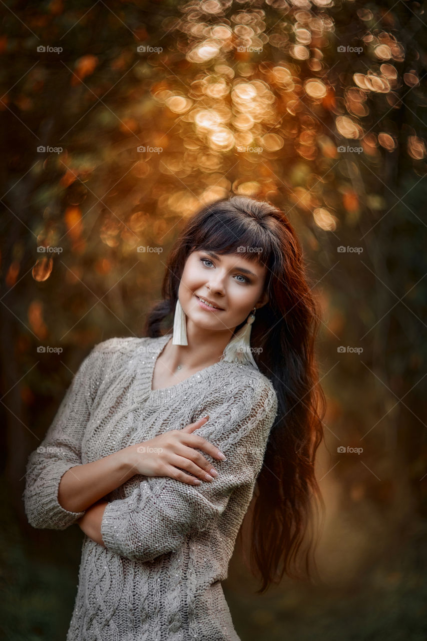 Beautiful young woman outdoor autumn portrait 