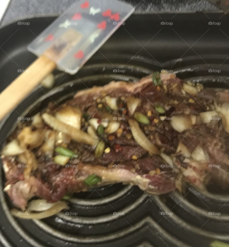Steak tasty onions cooked to perfection 