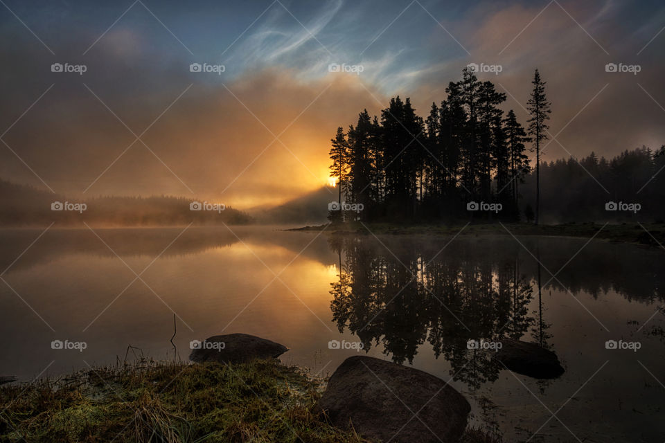 Sunrise from a lake in the mountain