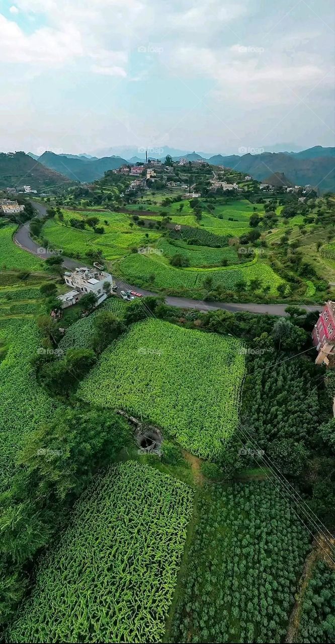 Glory be to God, the magnificent and picturesque view and the natural green trees are a view that is nothing more wonderful than it