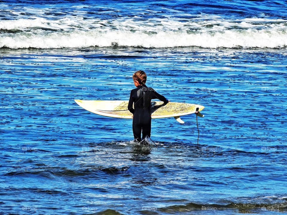 Young Boy Surfing