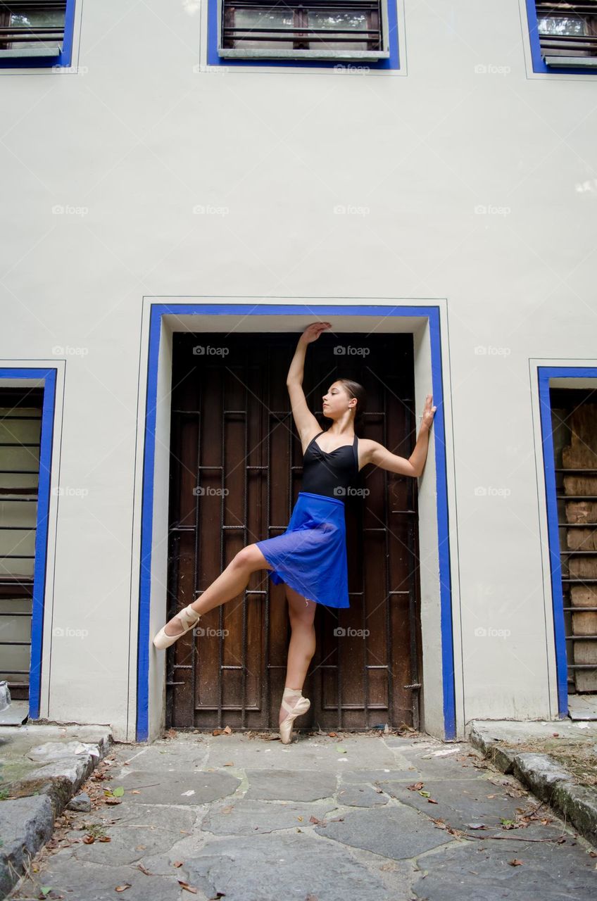 Young Female Ballerina Dancing Outside