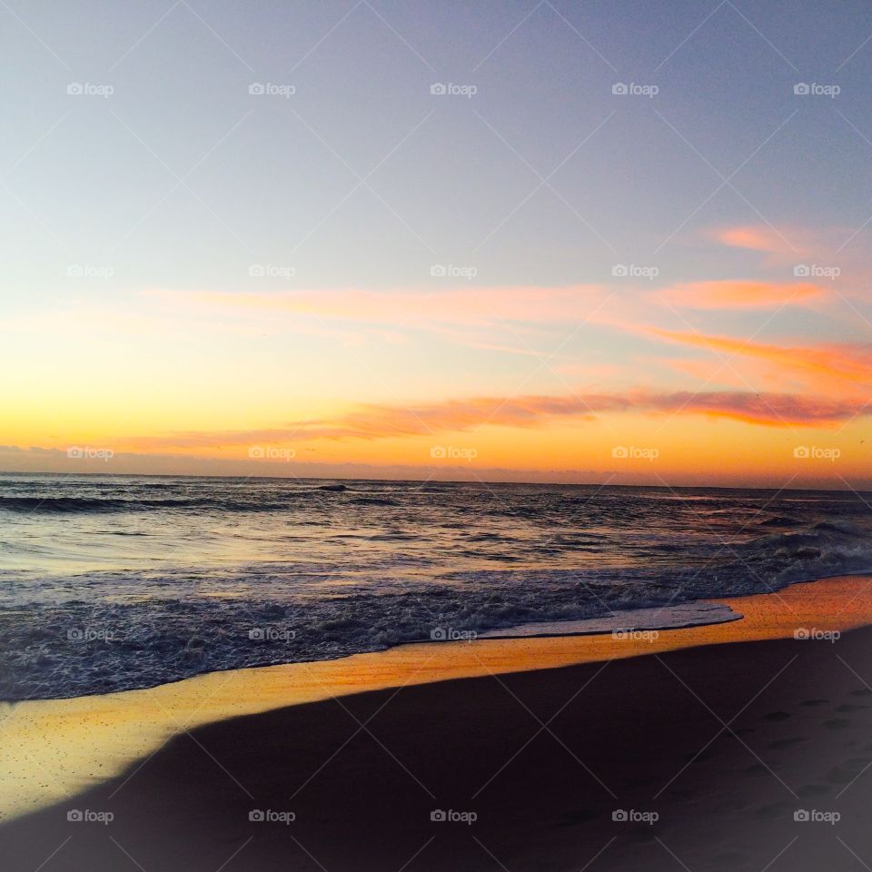 View of scenic sunrise at beach