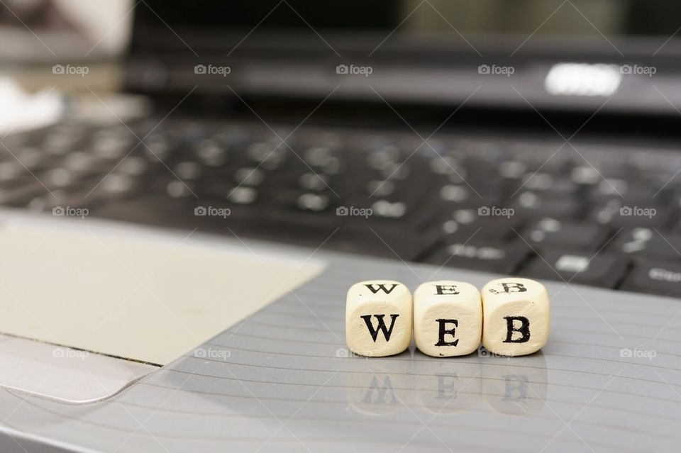 Laptop with dices