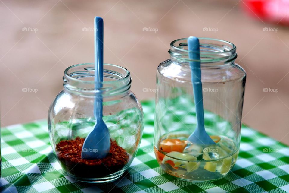 Seasonings in clear glass bottles