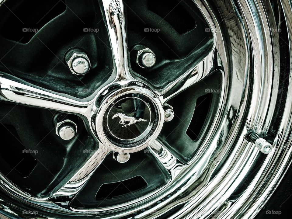 Mustang hubcap. Tooling down the road in style. 