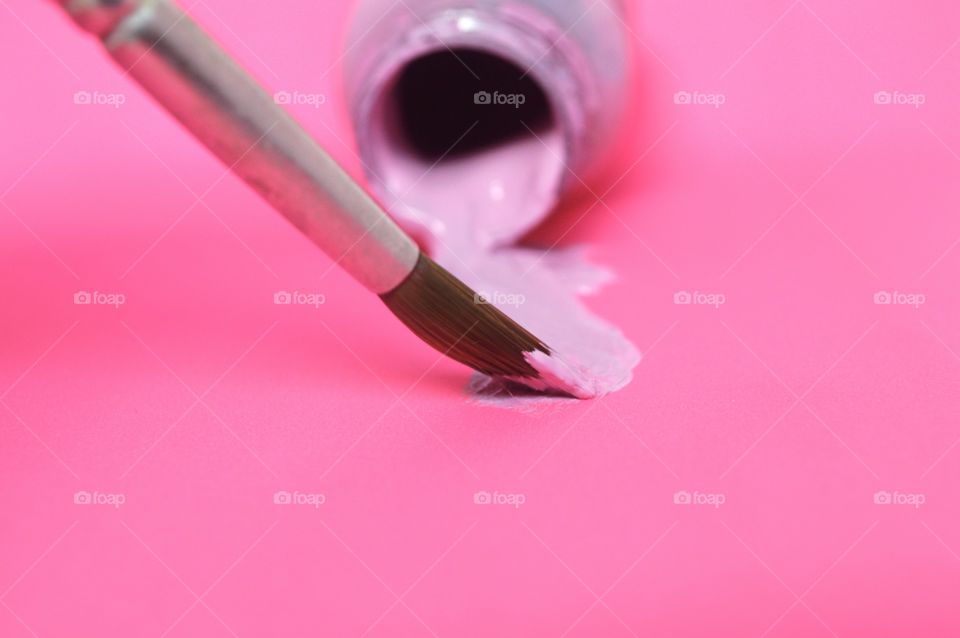 Pink paint color with paintbrush